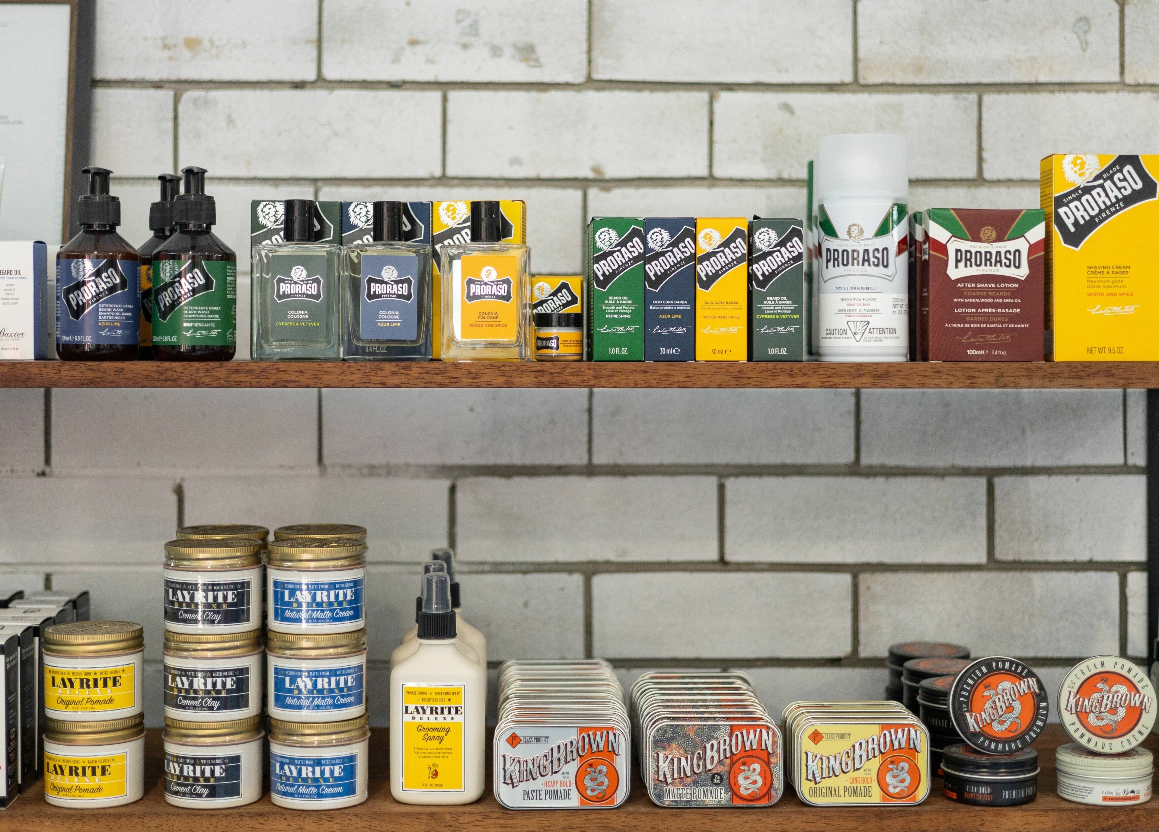 Shelves with grooming products at Grampa Ed, Banora Point, New South Wales, AU, showcasing various brands.