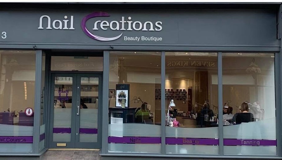 Front view of Nailcreations beauty boutique in Dunfermline, Scotland, GB, showcasing elegant window displays.