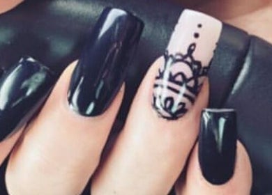 Intricate black and white nail art at Nailcreations, Dunfermline, Scotland, GB. Elegant manicure design.