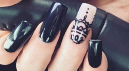 Intricate black and white nail art at Nailcreations, Dunfermline, Scotland, GB. Elegant manicure design.