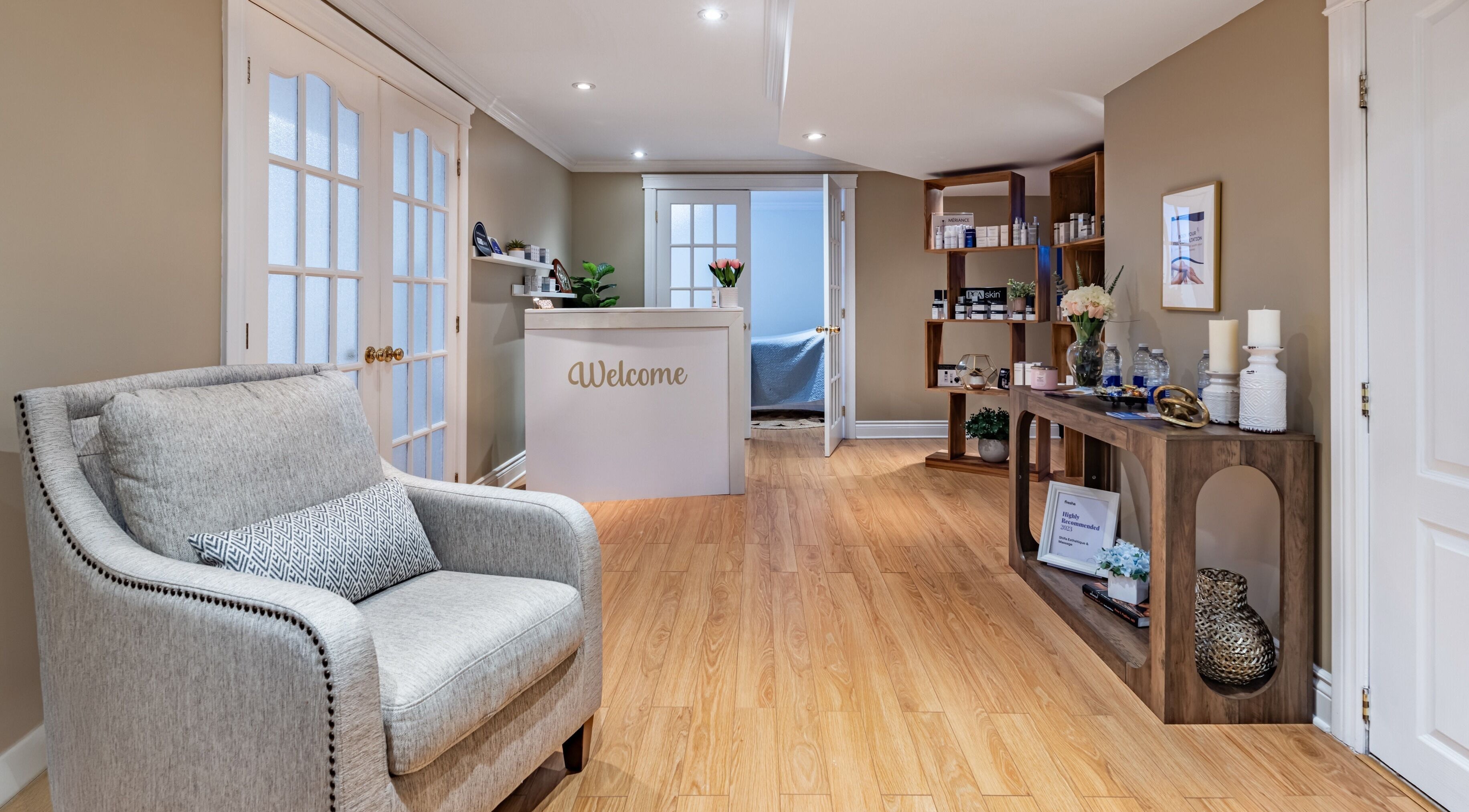 Inviting reception area at Shifa Esthétique and Massage, N.D.D Ile-Perrot, Canada, CA with cozy decor and seating.