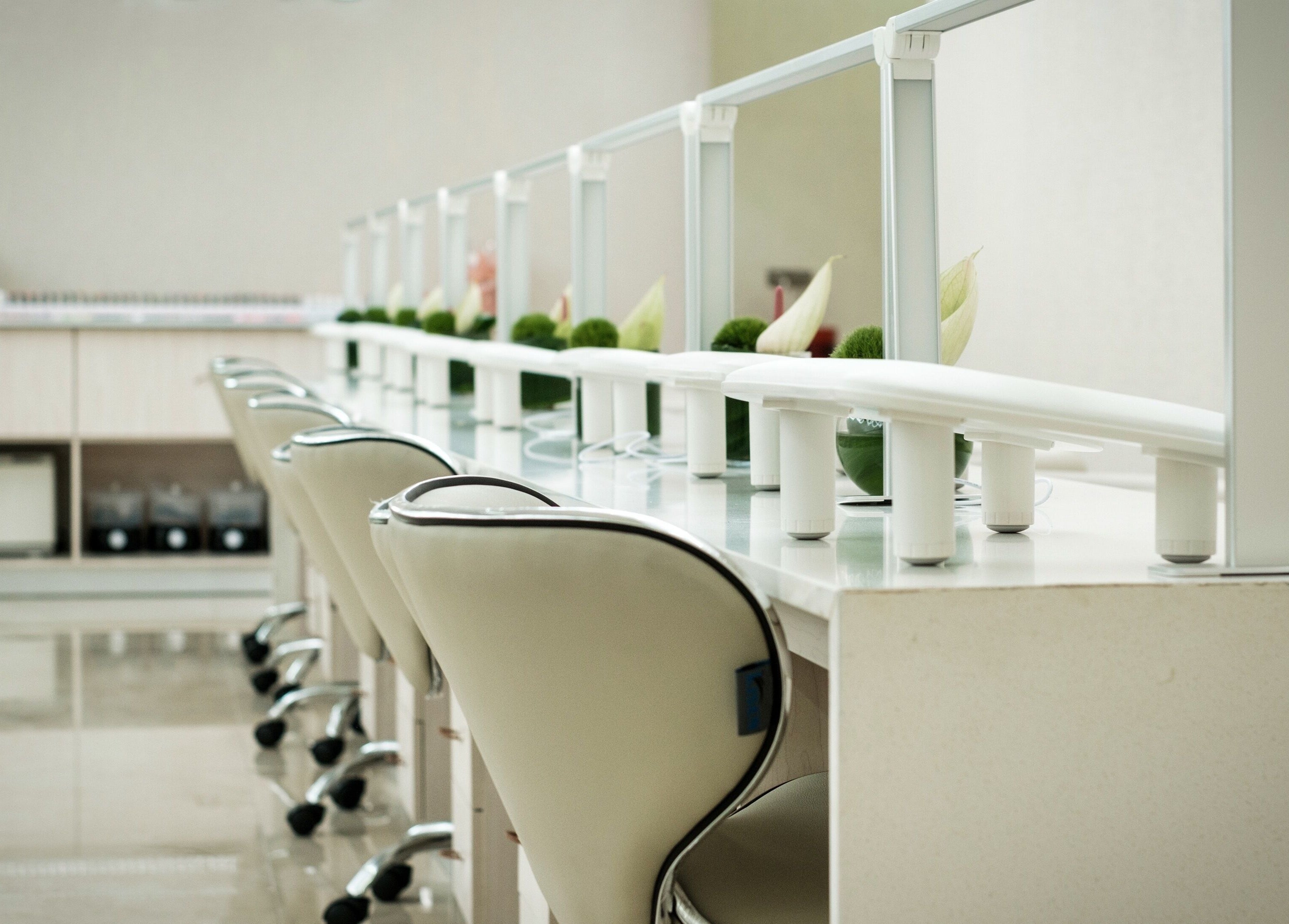 Elegant nail bar at Society 1840, Johannesburg, Gauteng, ZA, featuring modern seating and a polished design.