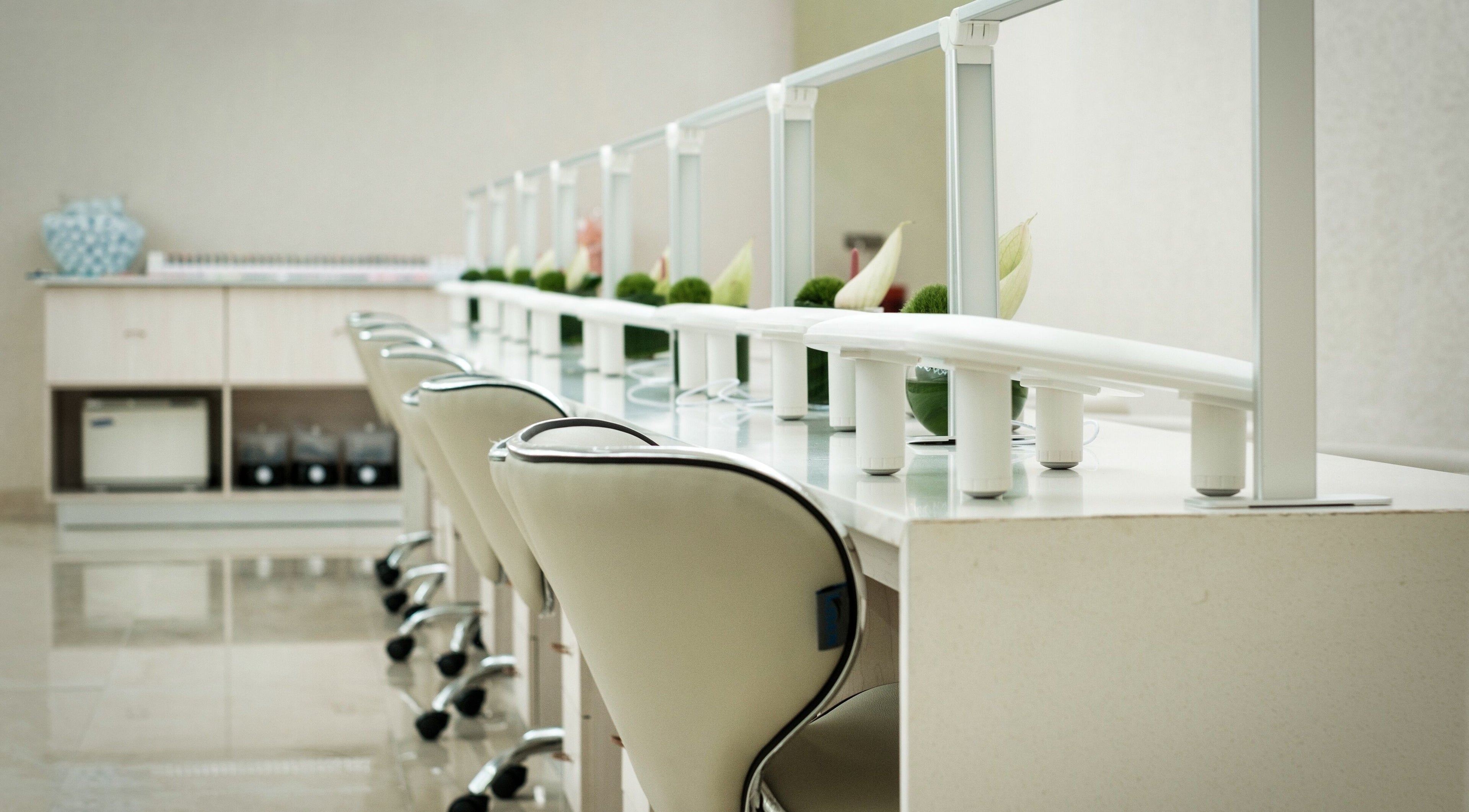 Elegant nail bar at Society 1840, Johannesburg, Gauteng, ZA, featuring modern seating and a polished design.