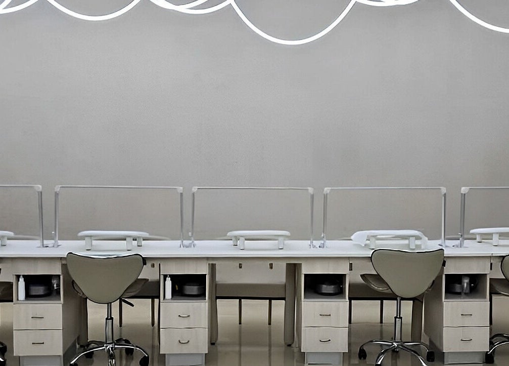 Modern nail stations at Society 1840, Johannesburg, Gauteng, ZA, offering stylish beauty services.