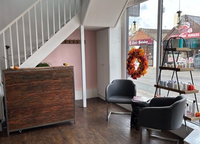 Inviting salon entry at Tanya at The Hair Boutique in Barrow upon Soar, England with elegant seating and decor.