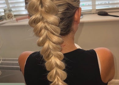 Intricate blonde braid styled at Amelia’s Hair and Beauty, Benfleet, England, GB.