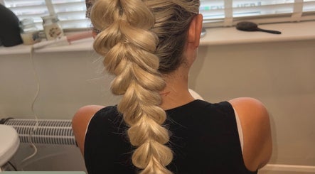 Intricate blonde braid styled at Amelia’s Hair and Beauty, Benfleet, England, GB.