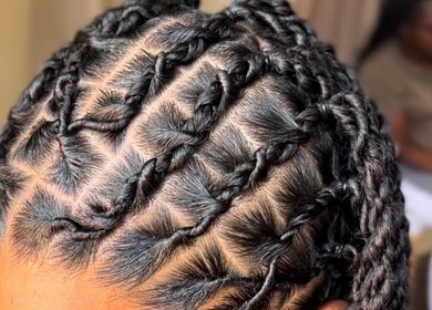 Intricate braid design at Loc N' Hold, Market Hill, Saint George, BB. Showcase your unique style here.
