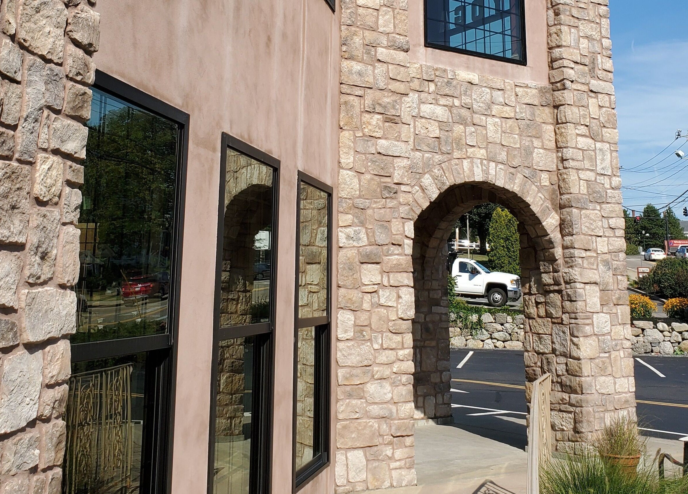 Joy Wellness for Life venue with stone facade located in Holbrook, Massachusetts, US, showcasing elegant architecture.