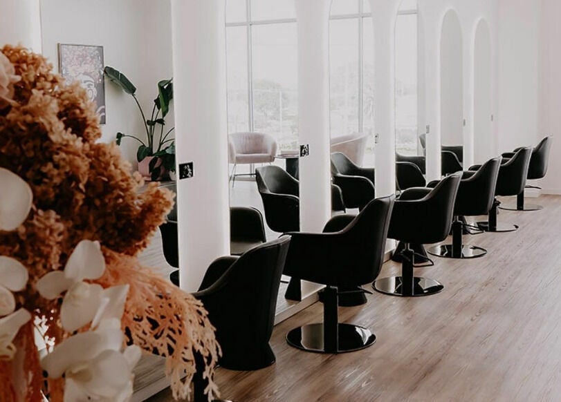 Chic interior of Meika Salon by Brooke Repcen in Melbourne, Victoria, AU, showcasing stylish salon chairs and decor.