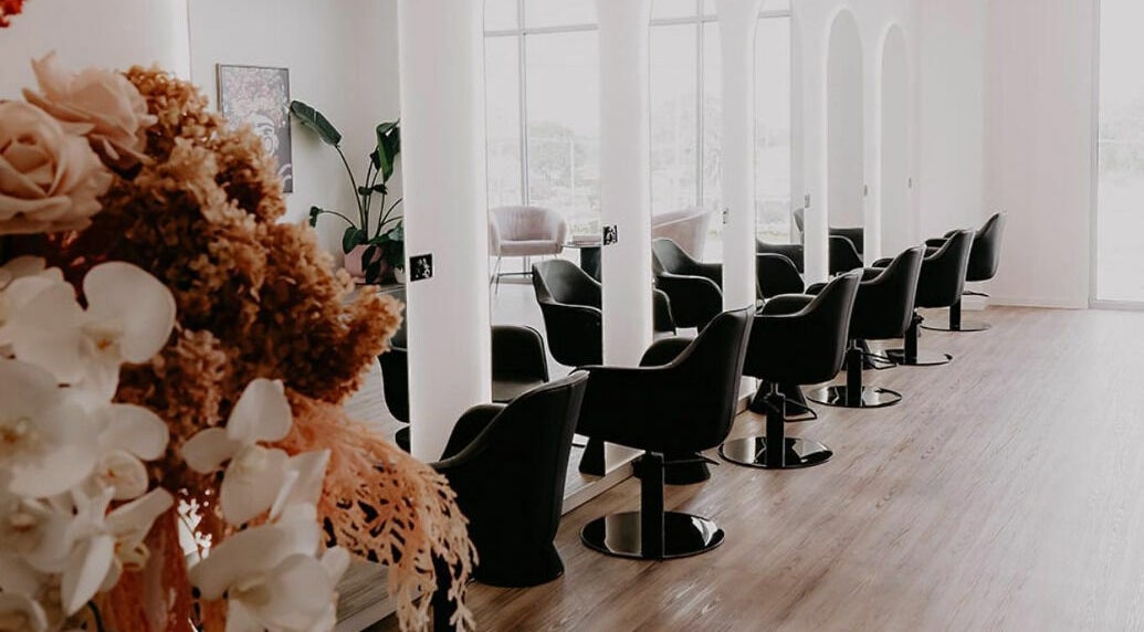 Chic interior of Meika Salon by Brooke Repcen in Melbourne, Victoria, AU, showcasing stylish salon chairs and decor.