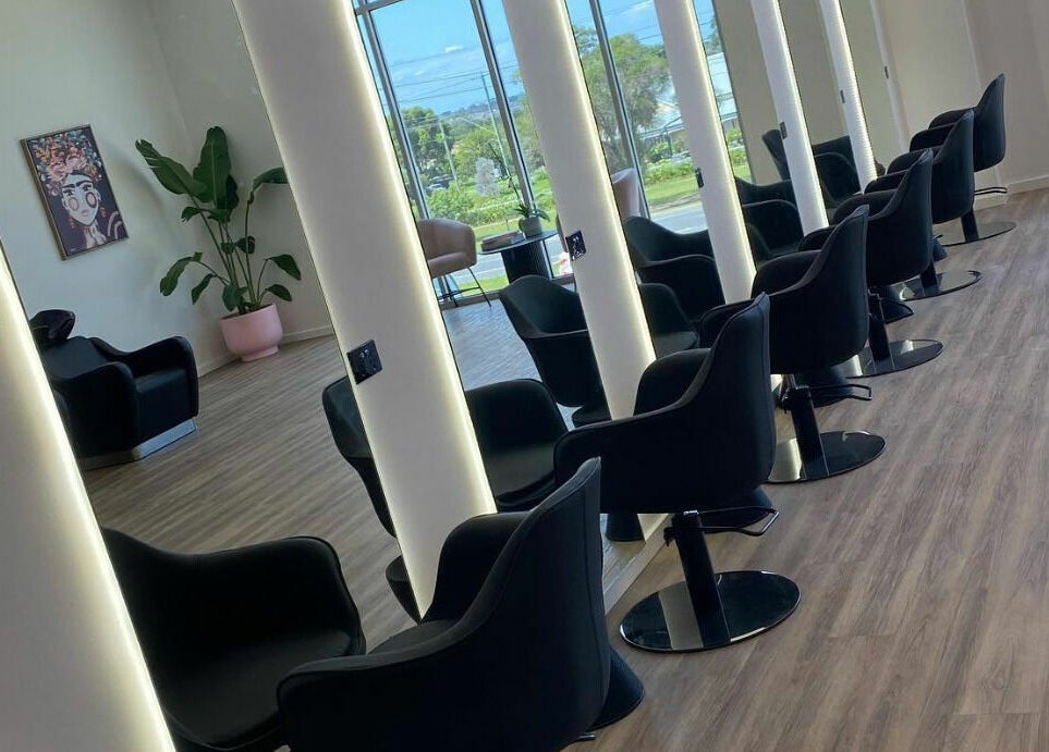 Modern, stylish interior of Meika Salon by Brooke Repcen in Melbourne, Victoria, AU with chic seating.