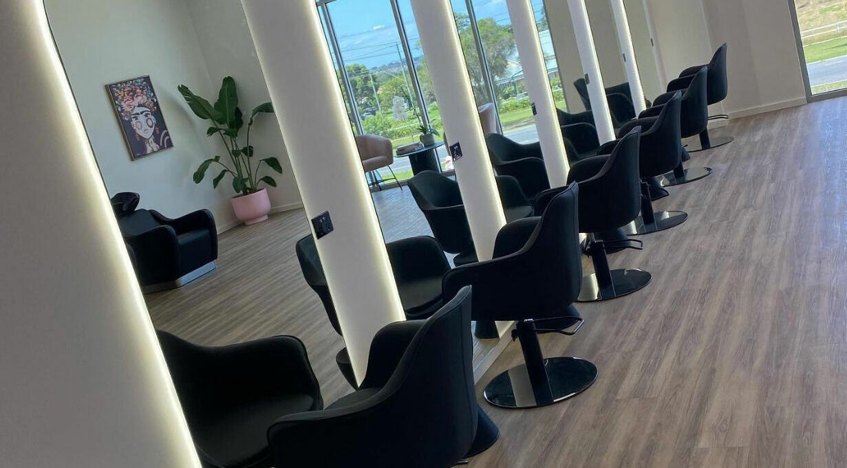 Modern, stylish interior of Meika Salon by Brooke Repcen in Melbourne, Victoria, AU with chic seating.