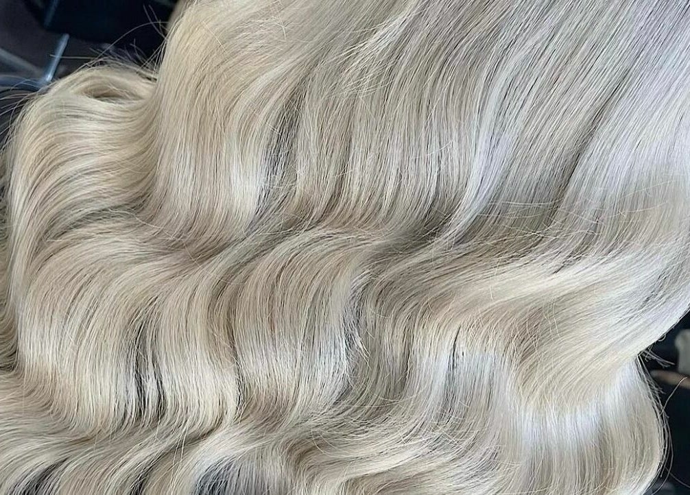 Luxurious wavy blonde hair styled at Meika Salon by Brooke Repcen, Melbourne, Victoria, AU.