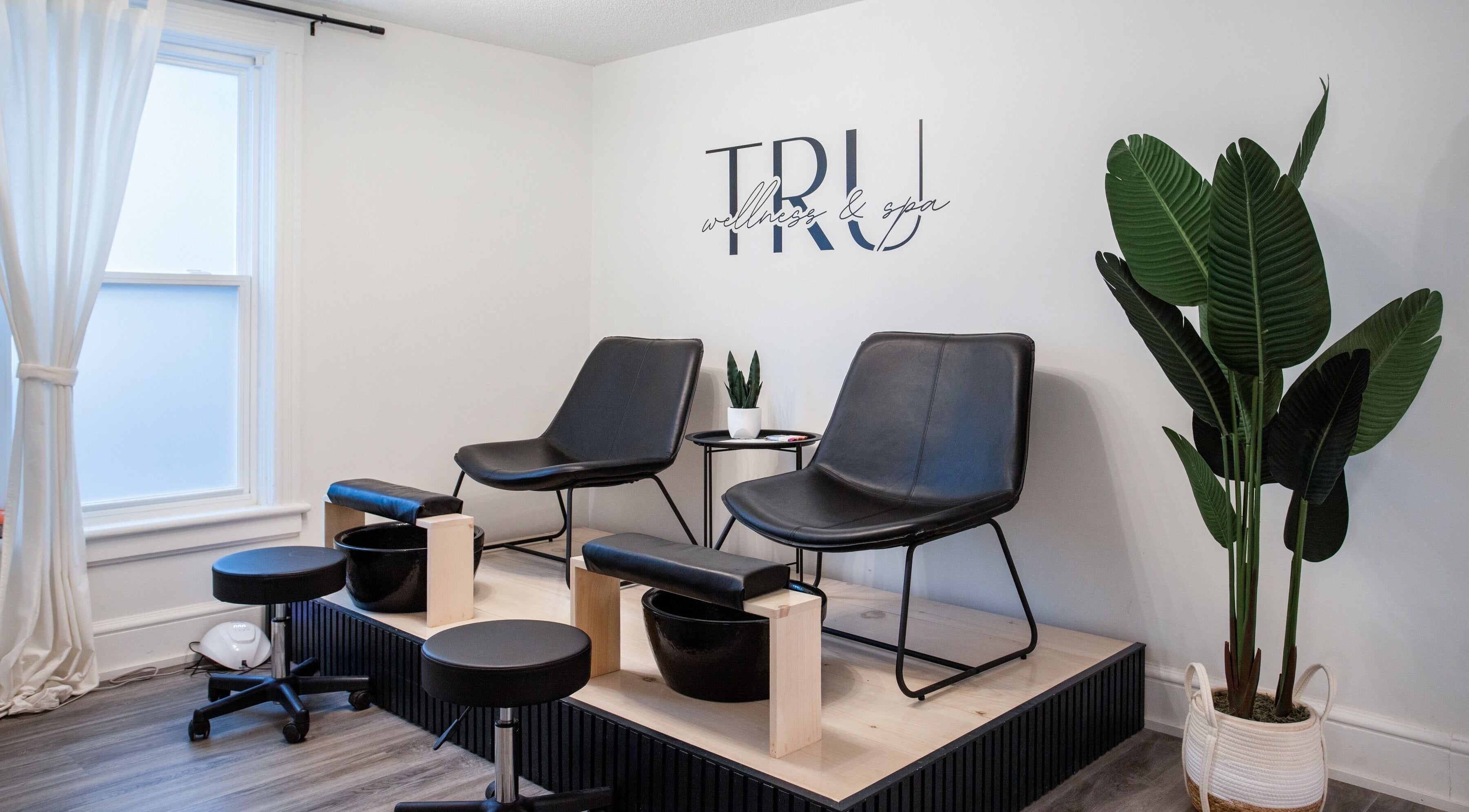 Modern pedicure chairs at Derma Luxe laser and skin, Cambridge, Ontario, CA for a soothing spa experience.