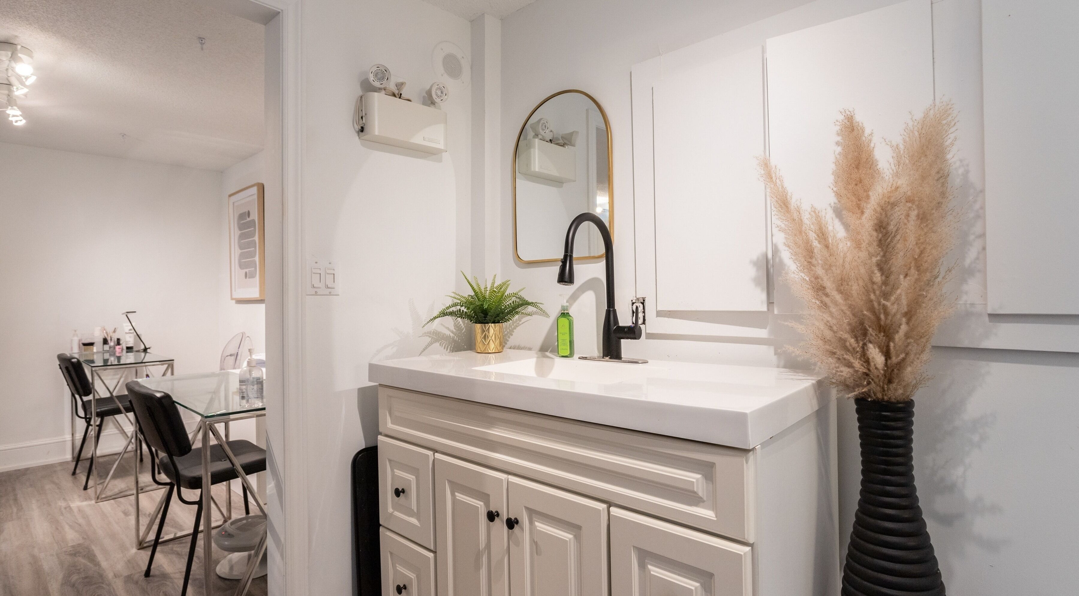 Elegant interior of Derma Luxe laser and skin, Cambridge, Ontario, CA with chic decor and modern furnishings.