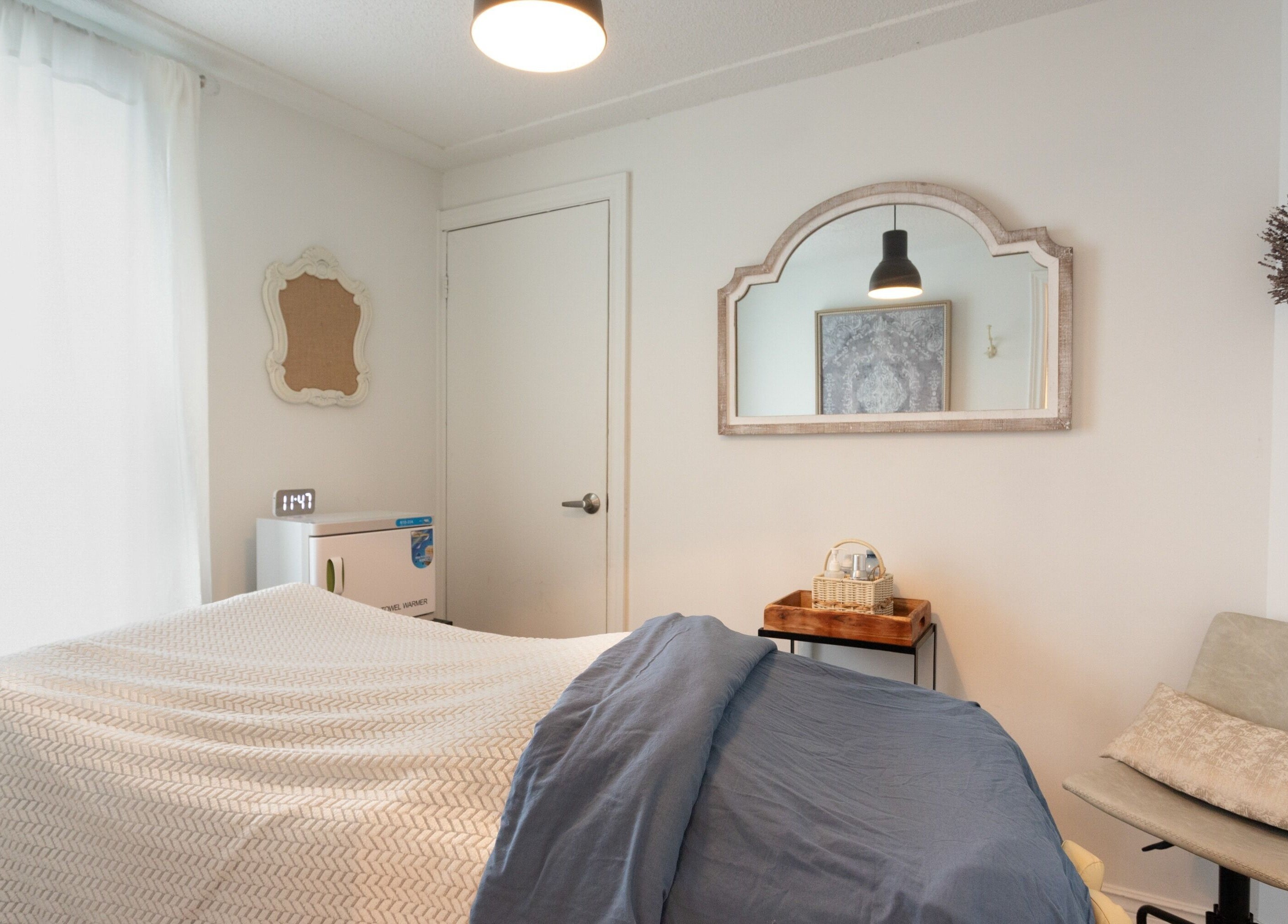 Serene treatment room at Derma Luxe laser and skin in Cambridge, Ontario, CA with elegant decor.