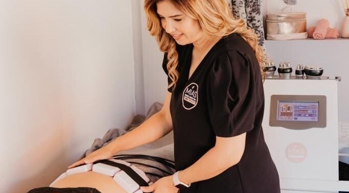 A beauty specialist providing treatment at MIAS - Tableview, Cape Town, Western Cape, ZA.