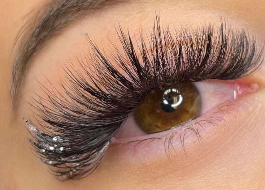 Close-up of stunning eyelash extensions at Lashed By Mir, Sault Ste. Marie, Ontario, CA, enhancing brown eyes beautifully.