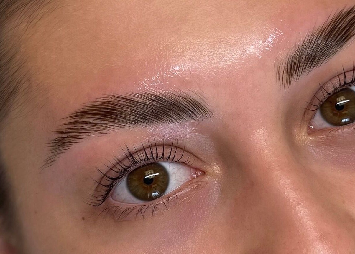 Close-up of expertly shaped brows at Lashed By Mir, Sault Ste. Marie, Ontario, CA.