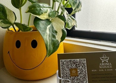 Smiley plant pot and Aroma Massage card in Auckland, NZ.