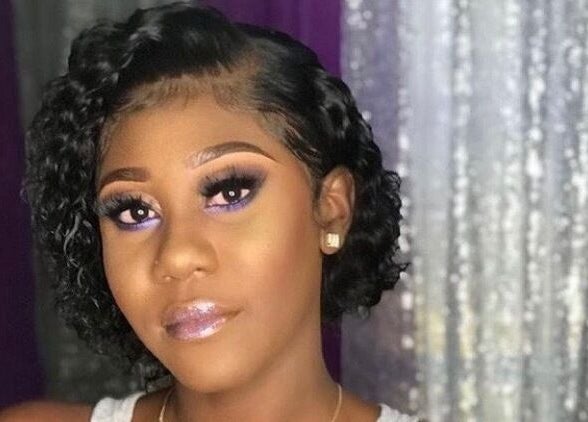 Stylishly designed curly wig at Dee Luxe Wigs, Saint George, Saint George, BB. Perfect for a glamorous appearance.