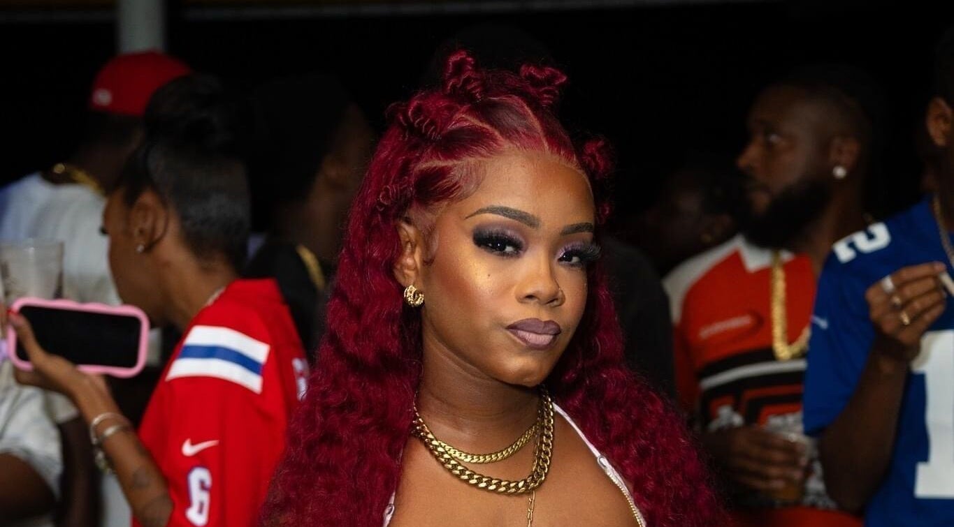 Chic lady with bold hairstyle at Dee Luxe Wigs, Saint George, BB.