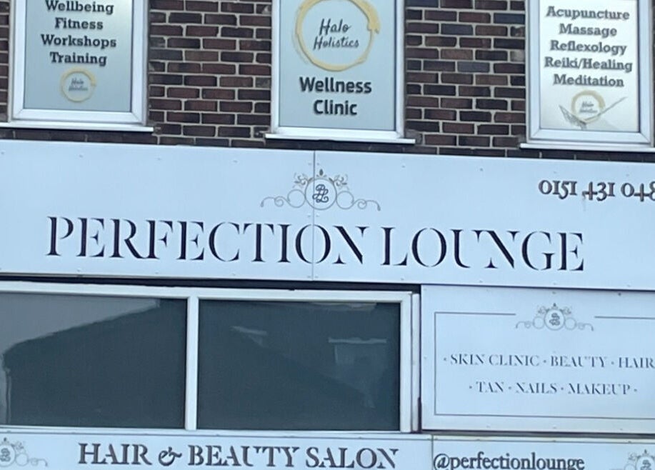 Facade of Halo Holistics at Perfection Lounge, Whiston, England, GB, showcasing wellness services.