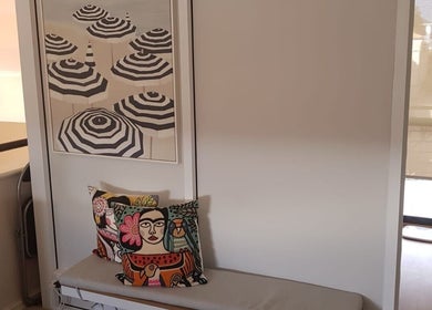 Stylish artwork and cushions in Contour Studio Perth, Yokine, Western Australia, AU highlighting a cozy ambiance.