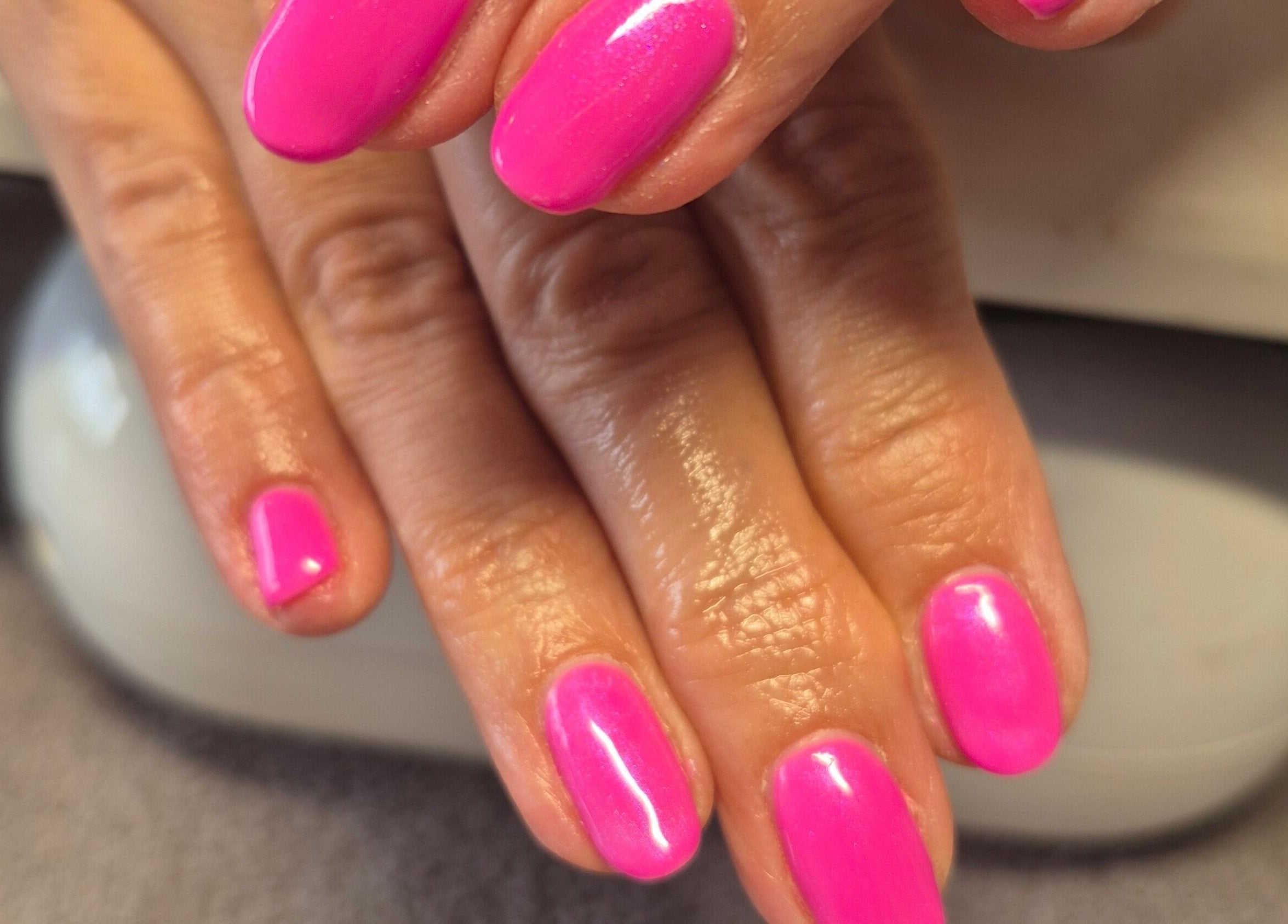 Vibrant pink nail art at Beauty with Nicky, Sutton Coldfield, England, GB.