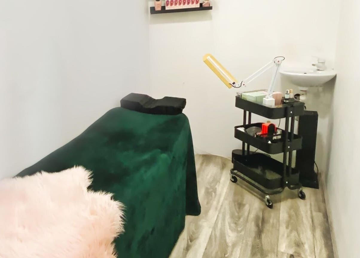 ELZYT beauty treatment room in Drogheda, County Louth, IE with relaxing setup and massage bed.
