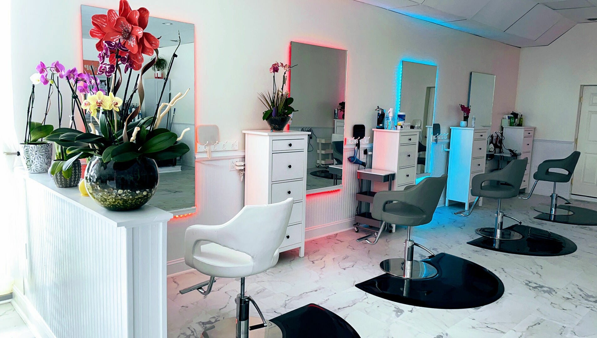 Modern salon interior at Cevaluk in Waynesboro, Virginia, US with vibrant decor and styling stations.
