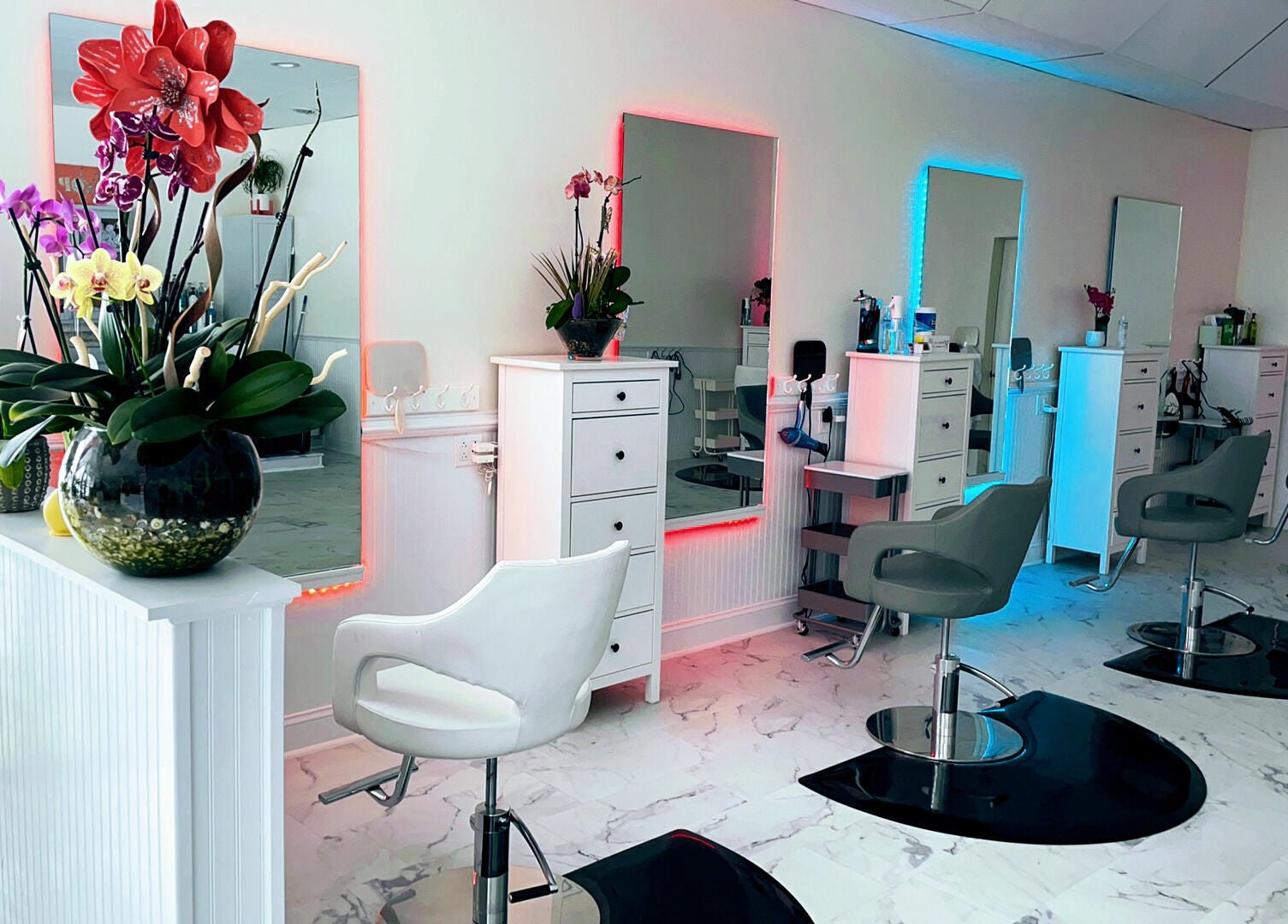 Modern salon interior at Cevaluk in Waynesboro, Virginia, US with vibrant decor and styling stations.