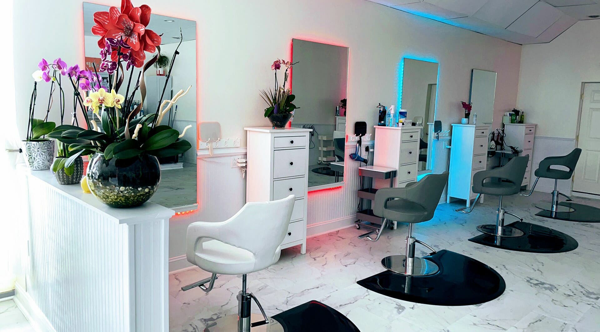 Modern salon interior at Cevaluk in Waynesboro, Virginia, US with vibrant decor and styling stations.
