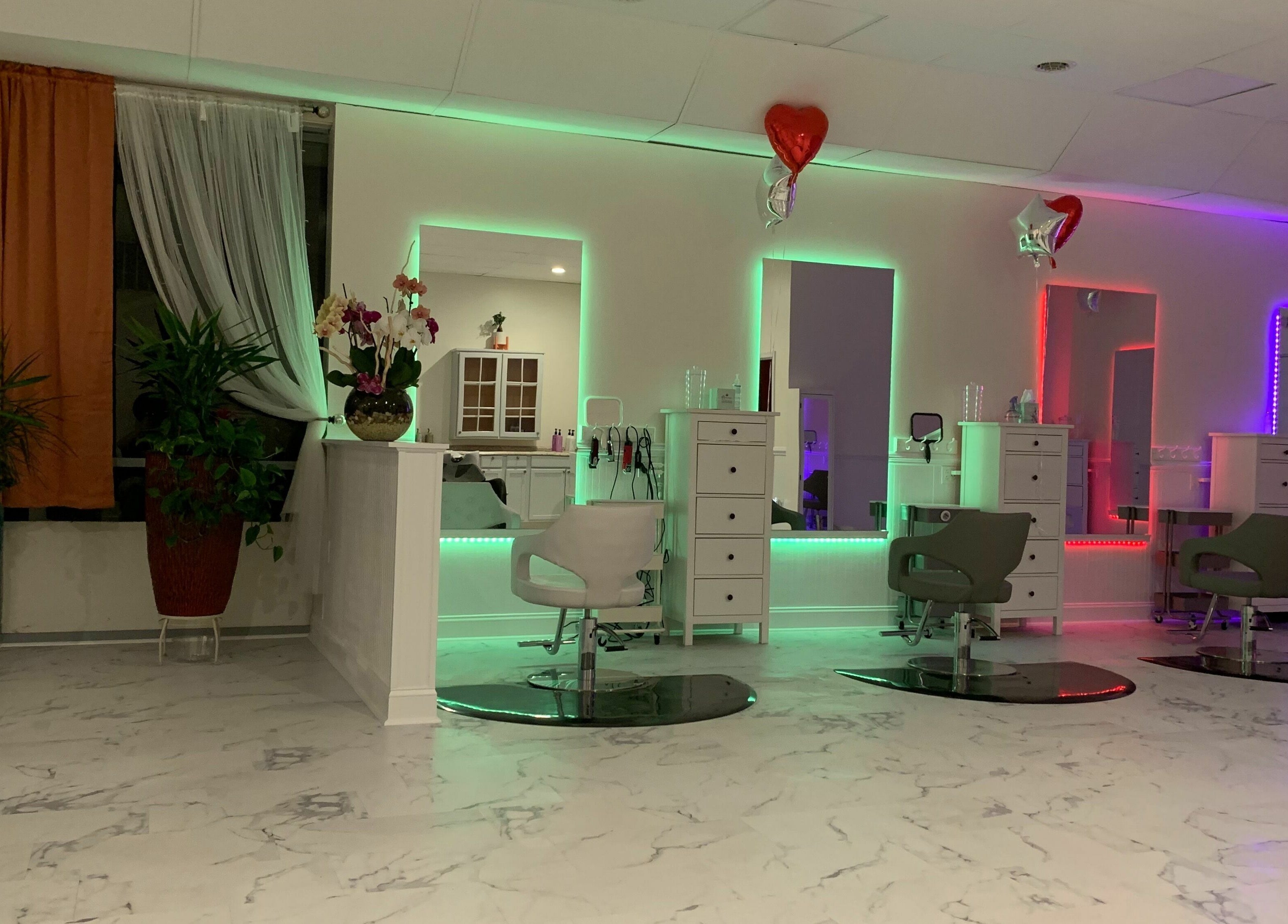Modern salon stations with vibrant lighting at Cevaluk, Waynesboro, Virginia, US.