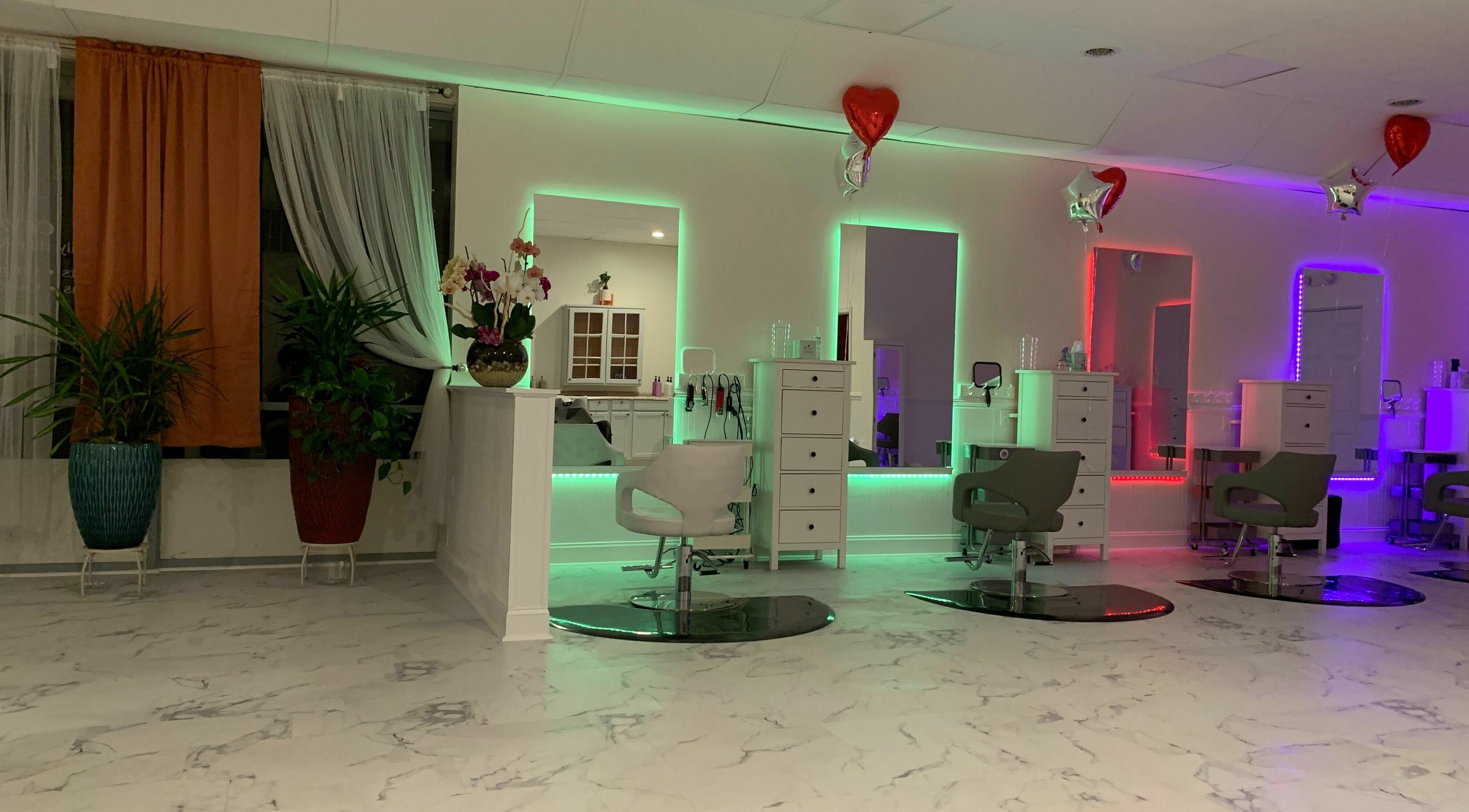 Modern salon stations with vibrant lighting at Cevaluk, Waynesboro, Virginia, US.