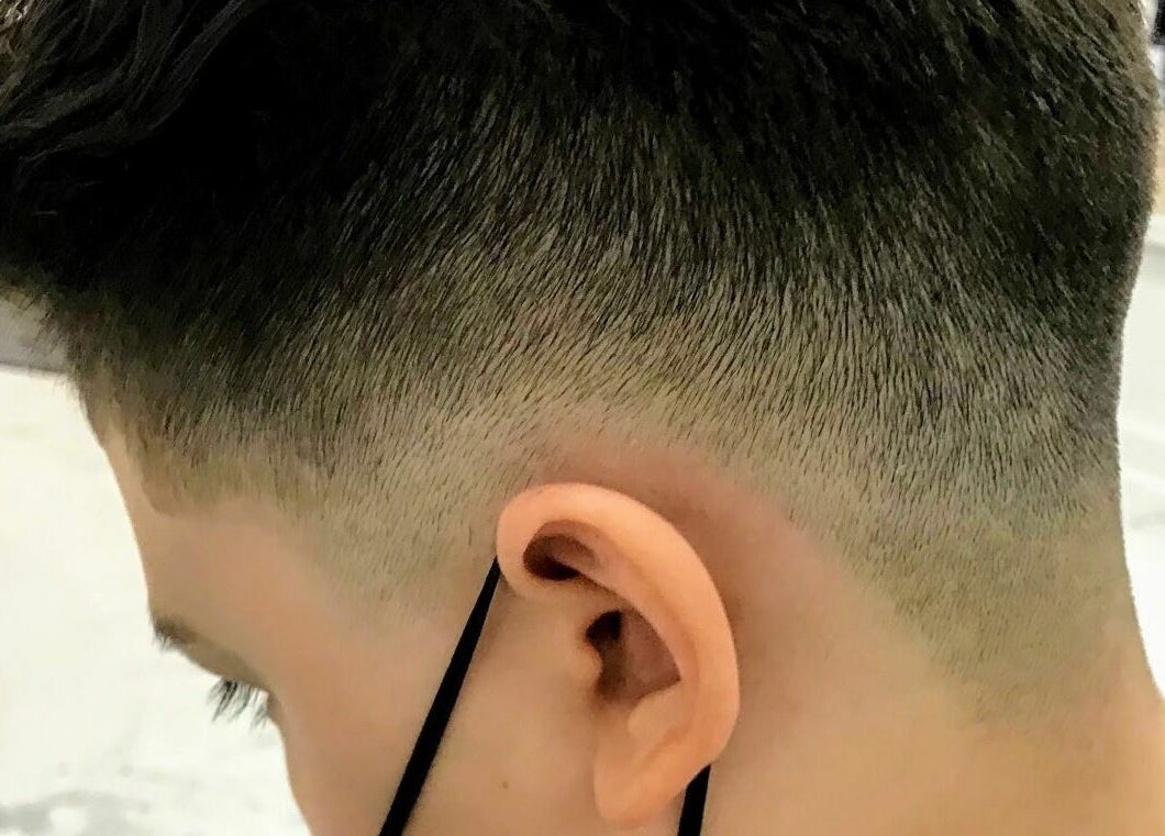 Close-up of a stylish fade haircut at Cevaluk in Waynesboro, Virginia, US.