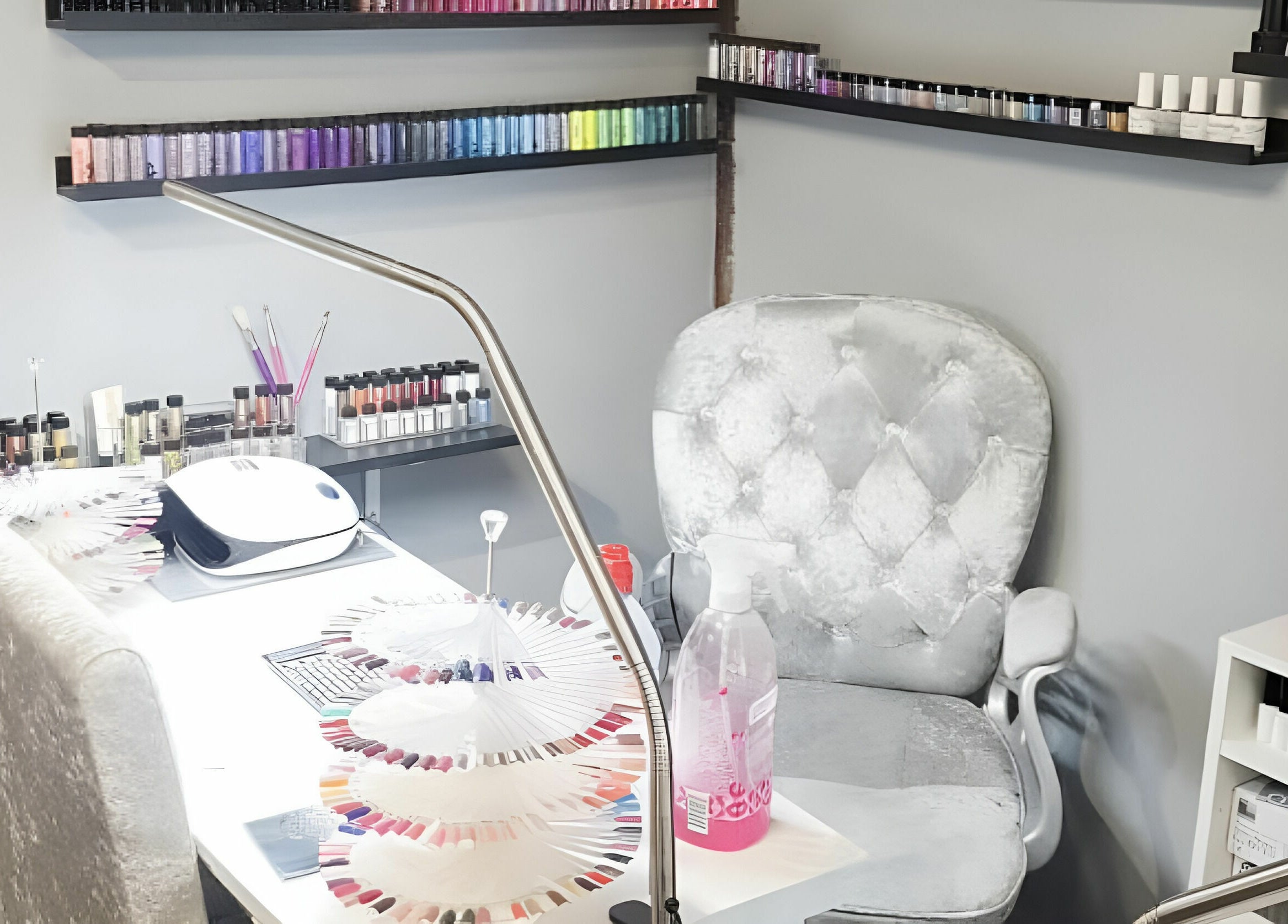 Elegant nail art station at KM Hair and Beauty, Braintree, England, GB, with vibrant polish display.