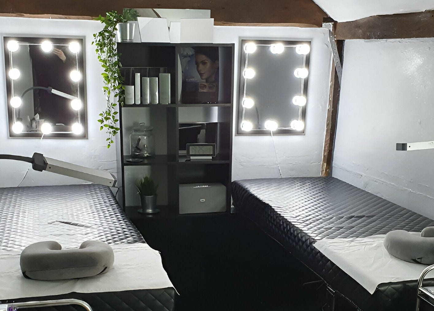 Luxurious spa room at KM Hair and Beauty, Braintree, England, GB with elegant lighting and plush treatment beds.