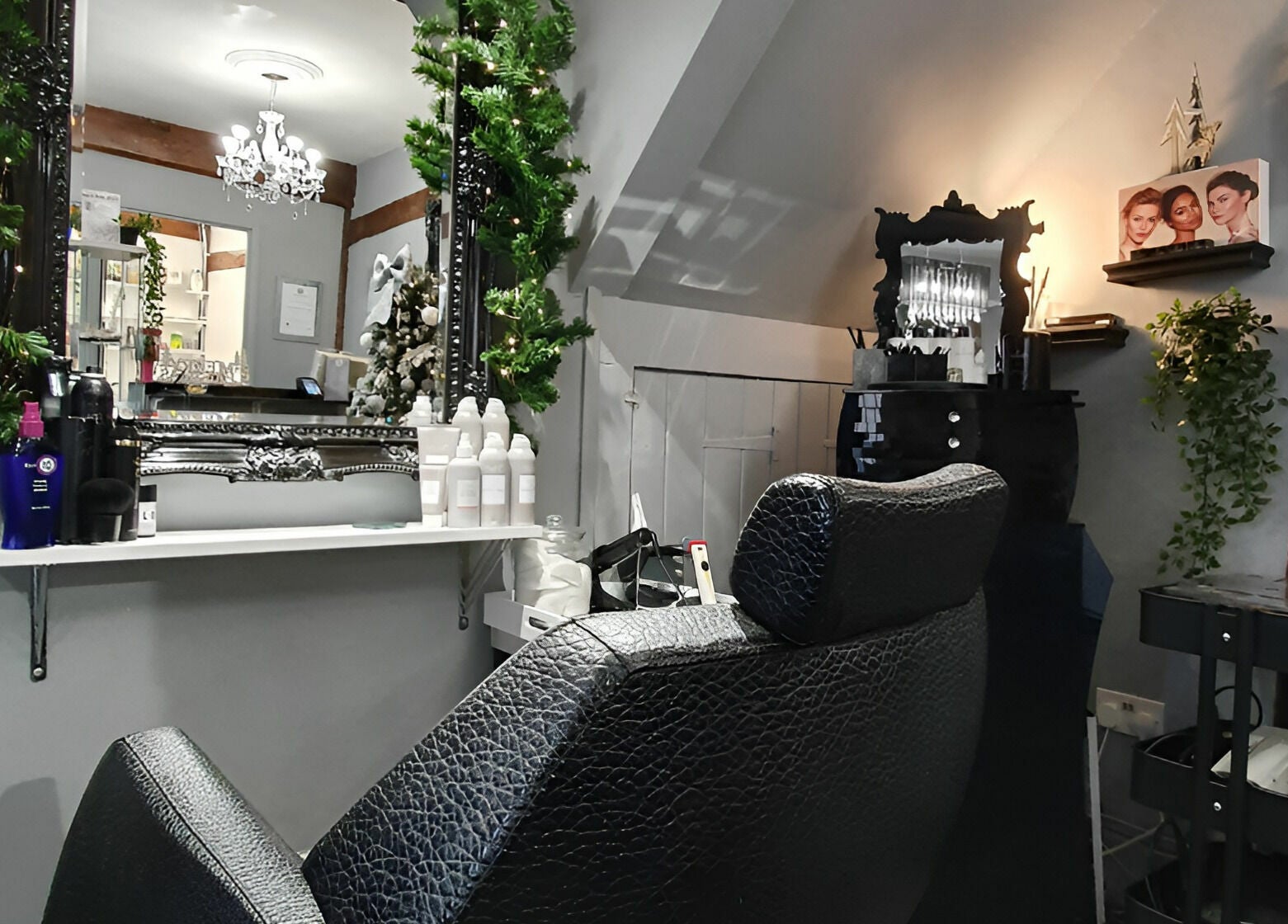 Luxurious chair and chic decor at KM Hair and Beauty, Braintree, England, GB, await visitors for a premium experience.