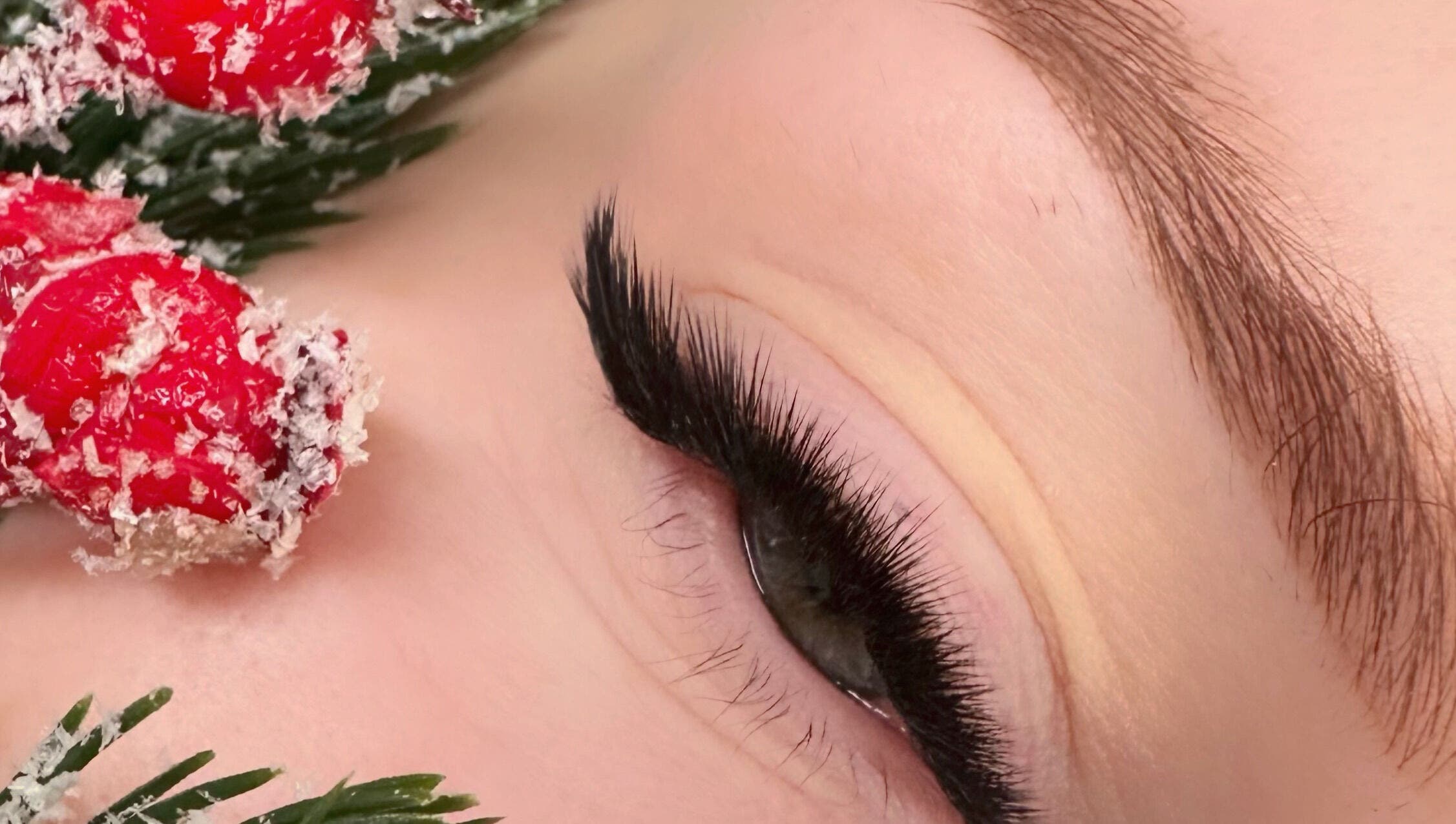 Close-up of styled eyelashes at M.E Glam Room in Sutton-in-Ashfield, England, GB with festive decor.