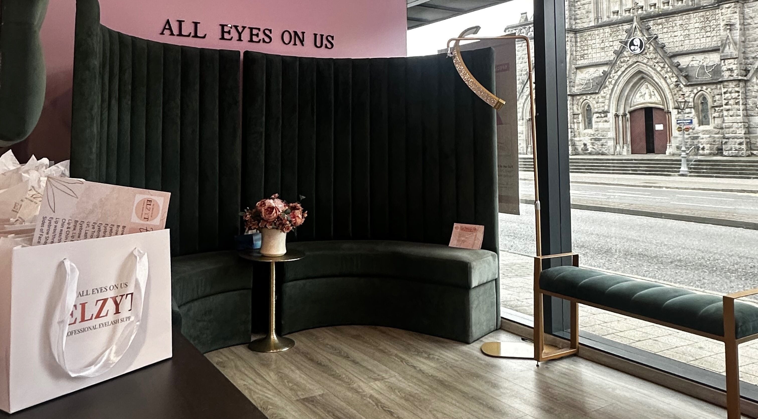 Elegant lounge area at Elzyt Salon Kristina, Drogheda, IE, showcasing plush seating and stylish decor.