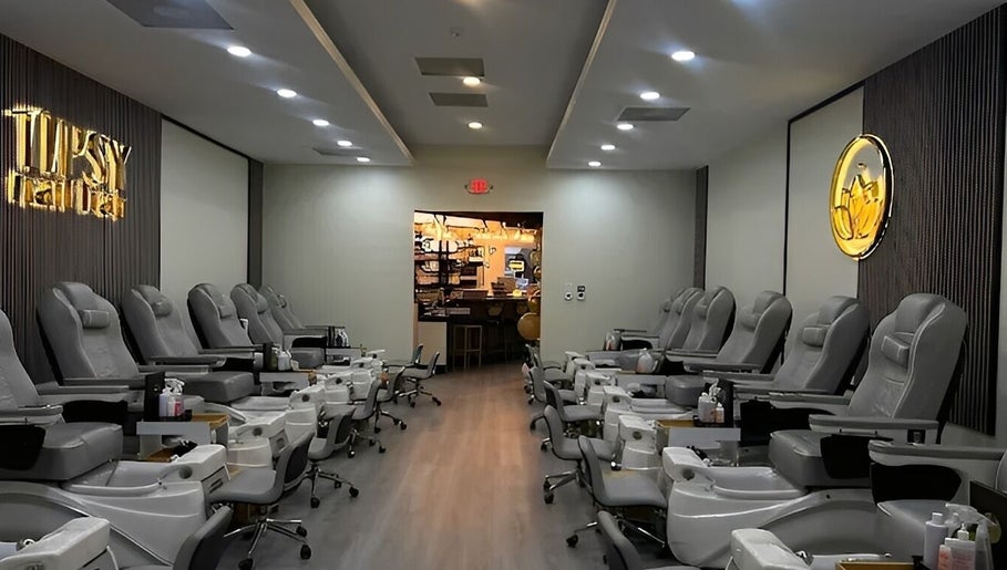 Luxurious nail salon chairs at Tipsy Nail Bar, College Parkway, Fort Myers, Florida, US.