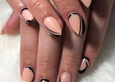 Elegant black-tipped nails at Tipsy Nail Bar, Daniels Parkway, Fort Myers, Florida, US.