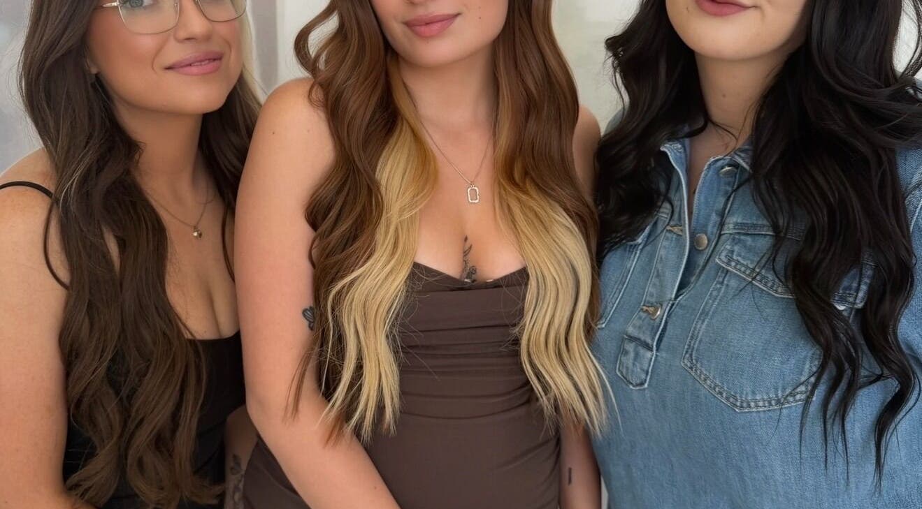 Stylish trio at Sass n Co, Cheltenham, Victoria, AU showcasing their hair and style in a cozy setting.