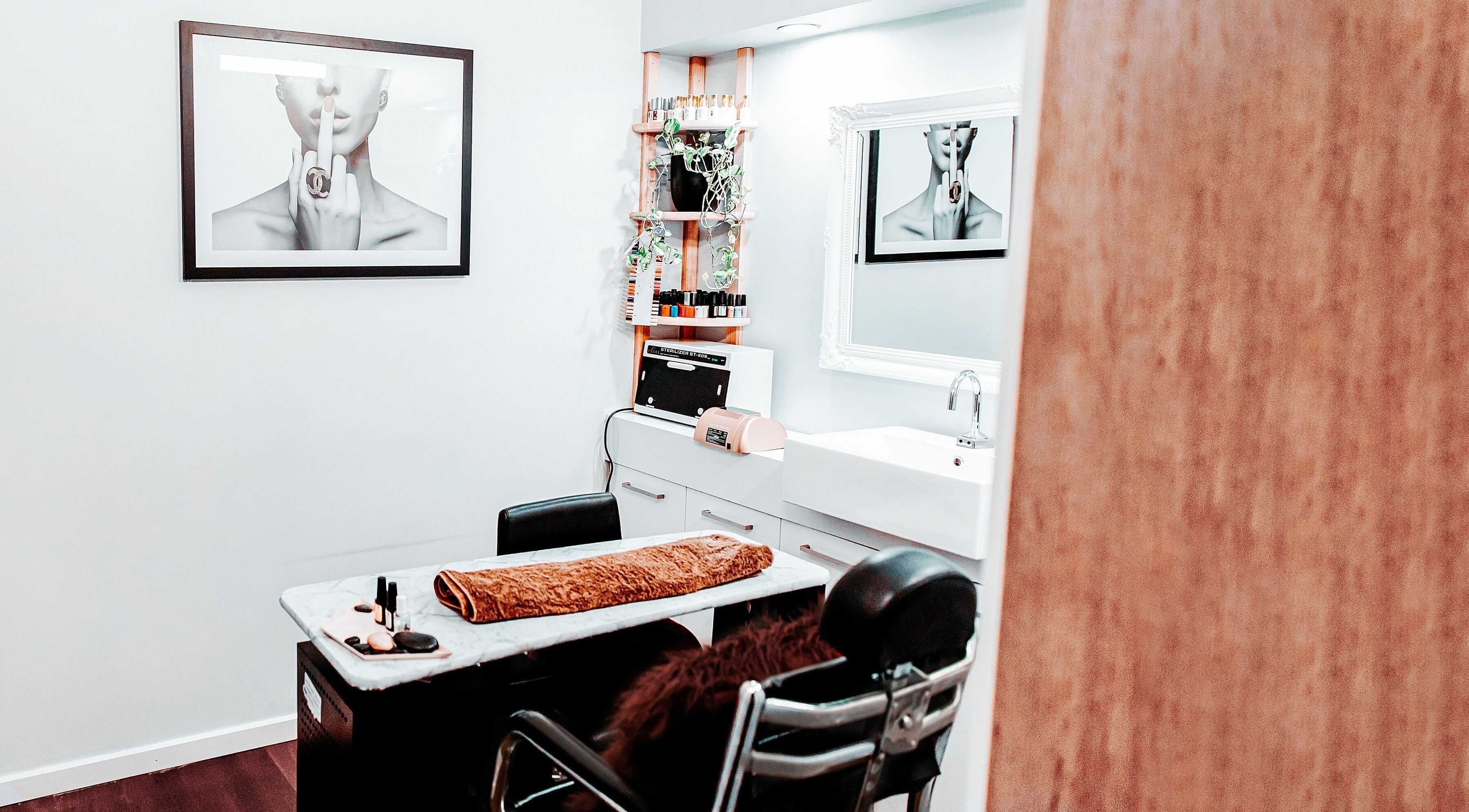 Cozy nail treatment room at Le Spa De Jour - Seddon, VIC, AU, with a chic minimalist vibe.