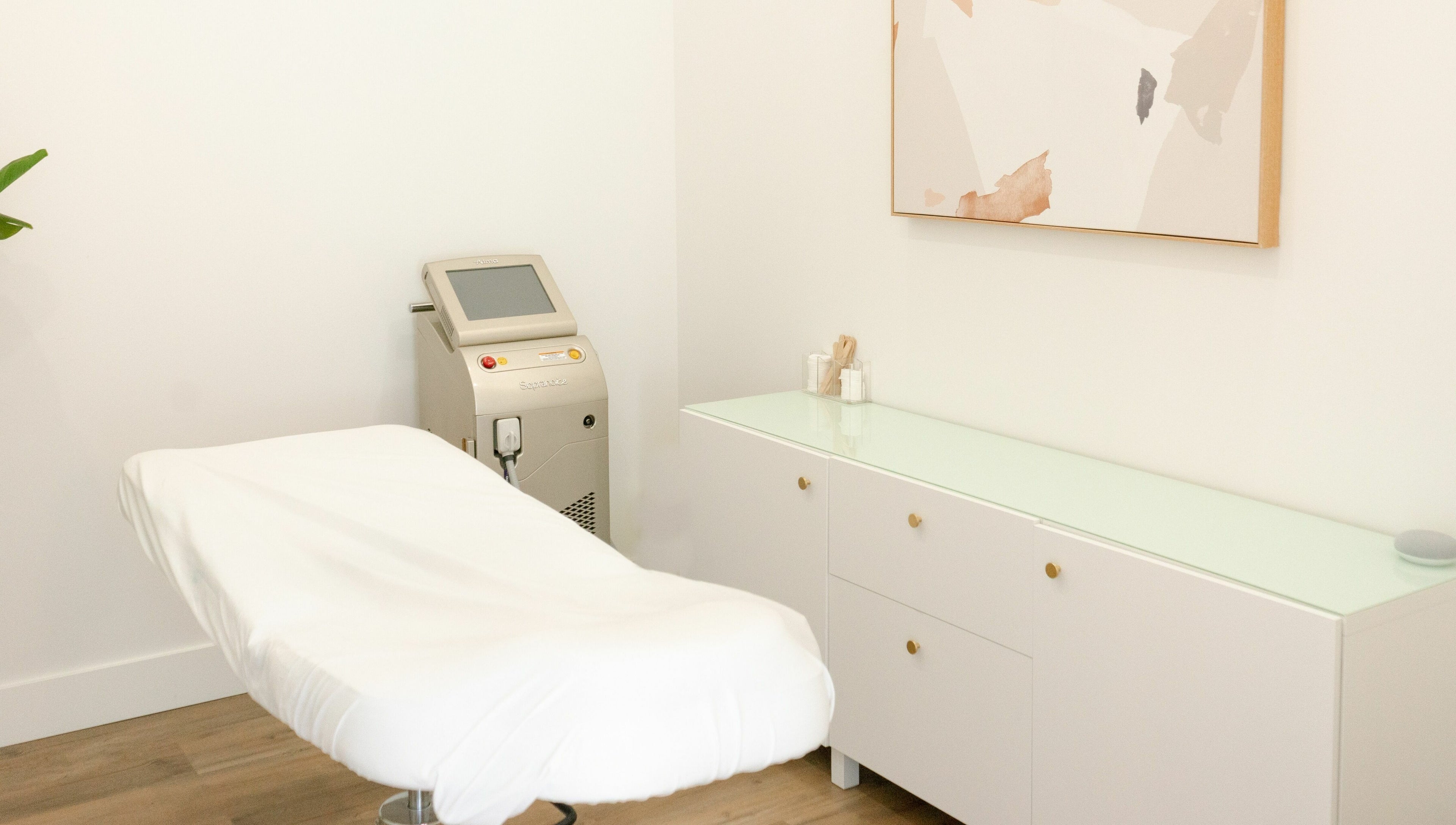 Elegant laser treatment room at Laser Bar, Barrie, Ontario, CA, featuring a sleek, modern design.