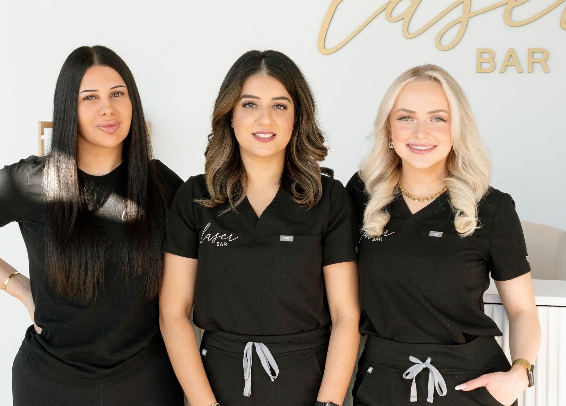 Friendly staff at Laser Bar in Barrie, Ontario, CA, offering expert beauty services with a professional touch.