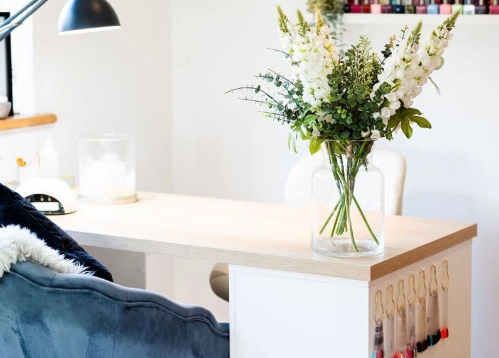 Elegant salon table with flowers at Practically Perfect in Every Way, Tewin, England, GB.