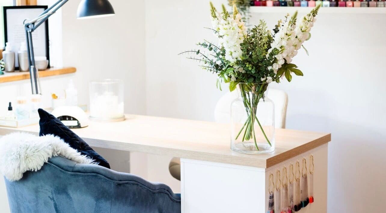 Elegant salon table with flowers at Practically Perfect in Every Way, Tewin, England, GB.